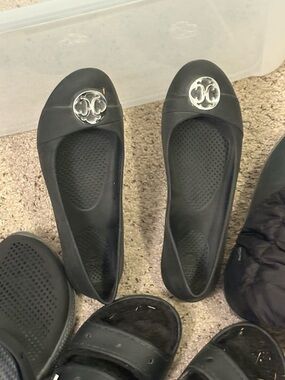 CROCS Black Slip-On Ballet Flats with Silver Round Emblem